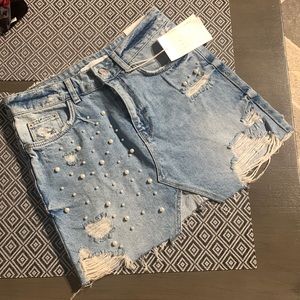 Zara distressed denim mini skirt
